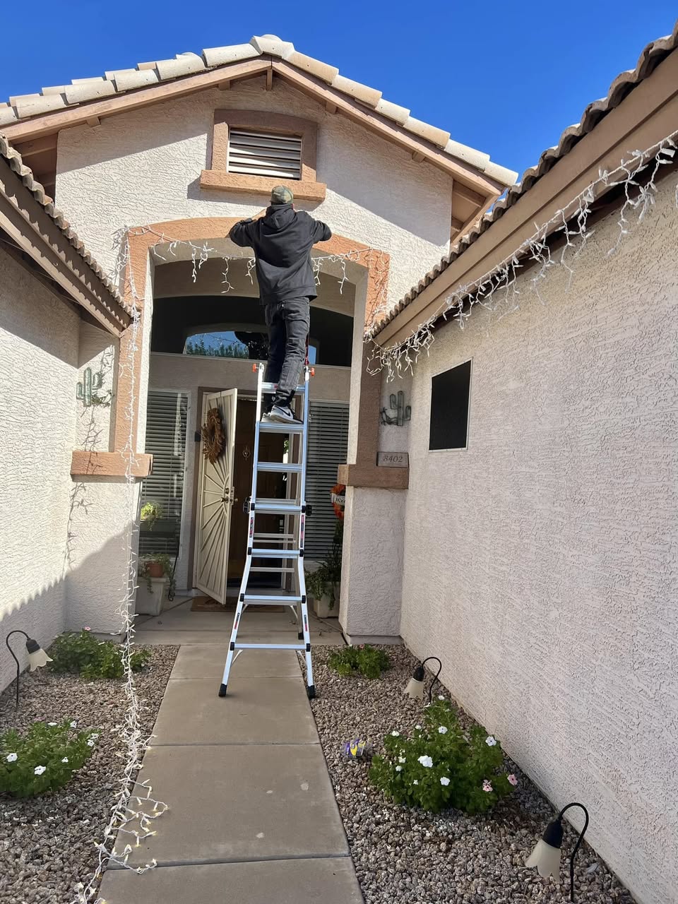 Arizona Install — ladder at entry arch
